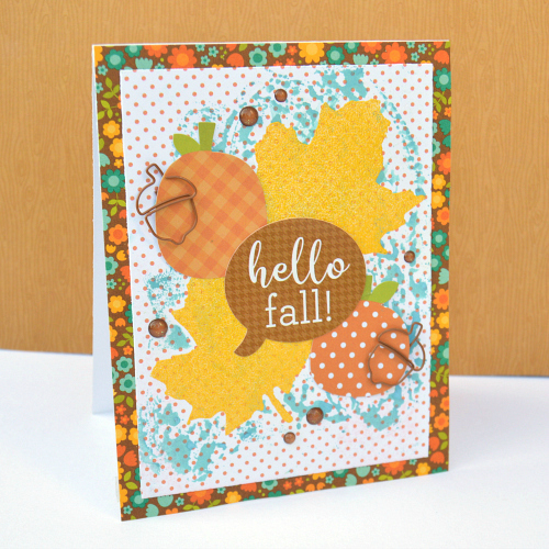 Heat embossing using adhesive sheets on a fall card