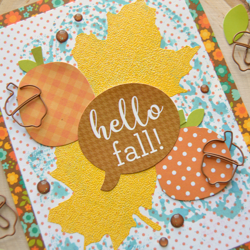Heat embossing using adhesive sheets on a fall card
