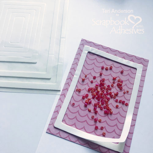 Adding beads to the Big Hello Easy Shaker Card Tutorial by Teri Anderson for Scrapbook Adhesives by 3L